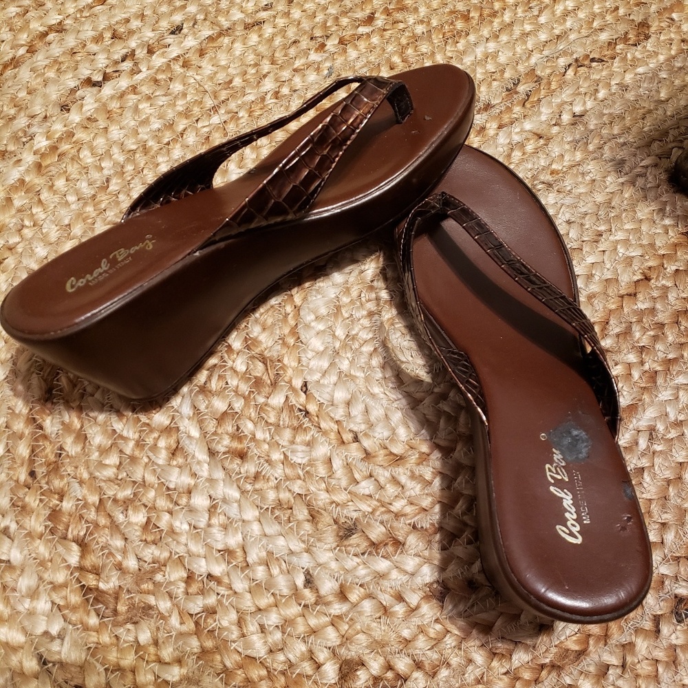 Brown heel flip flops